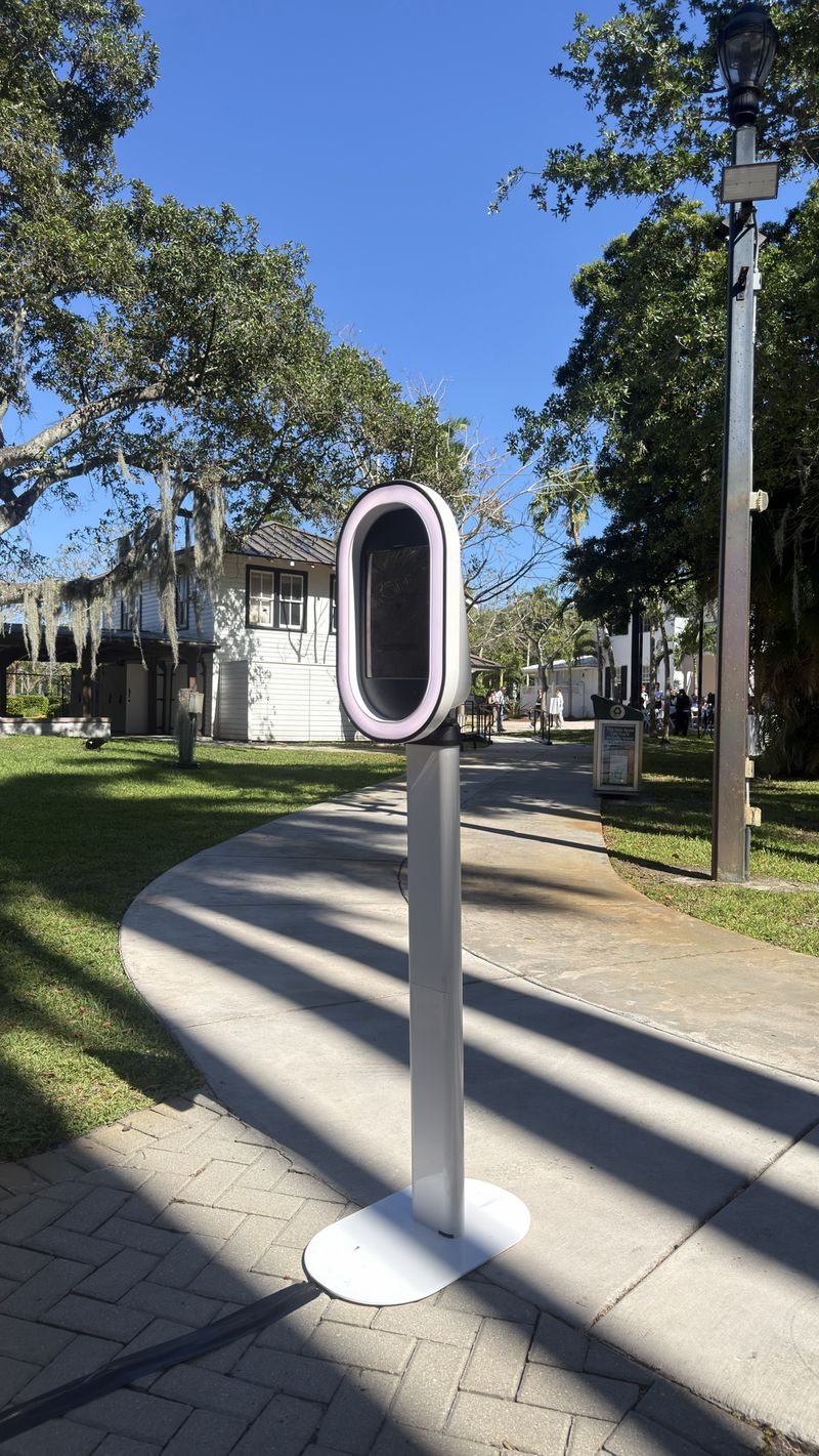 Snap Happy digital photo booth set up at an outdoor South Florida event
