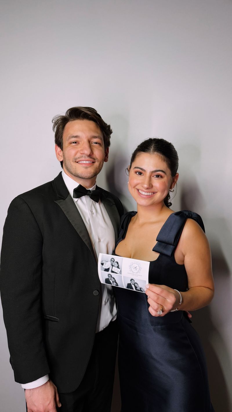 Couple smiling with their custom wedding print